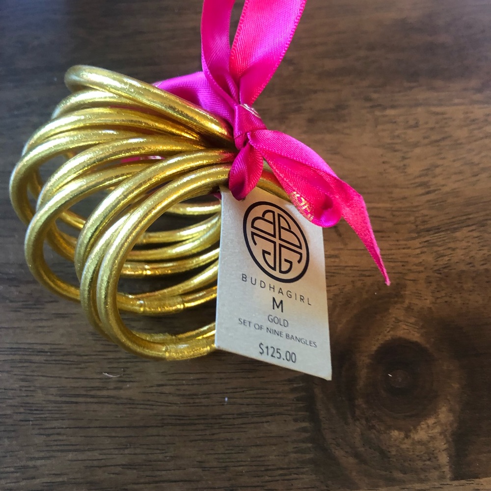 Set of nine medium gold Budha girl bracelets